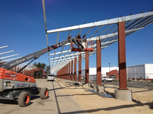 Two carport structures being constructed by Beaumont Solar - 414.96kW of the total 792.48kW system will be installed on the carports