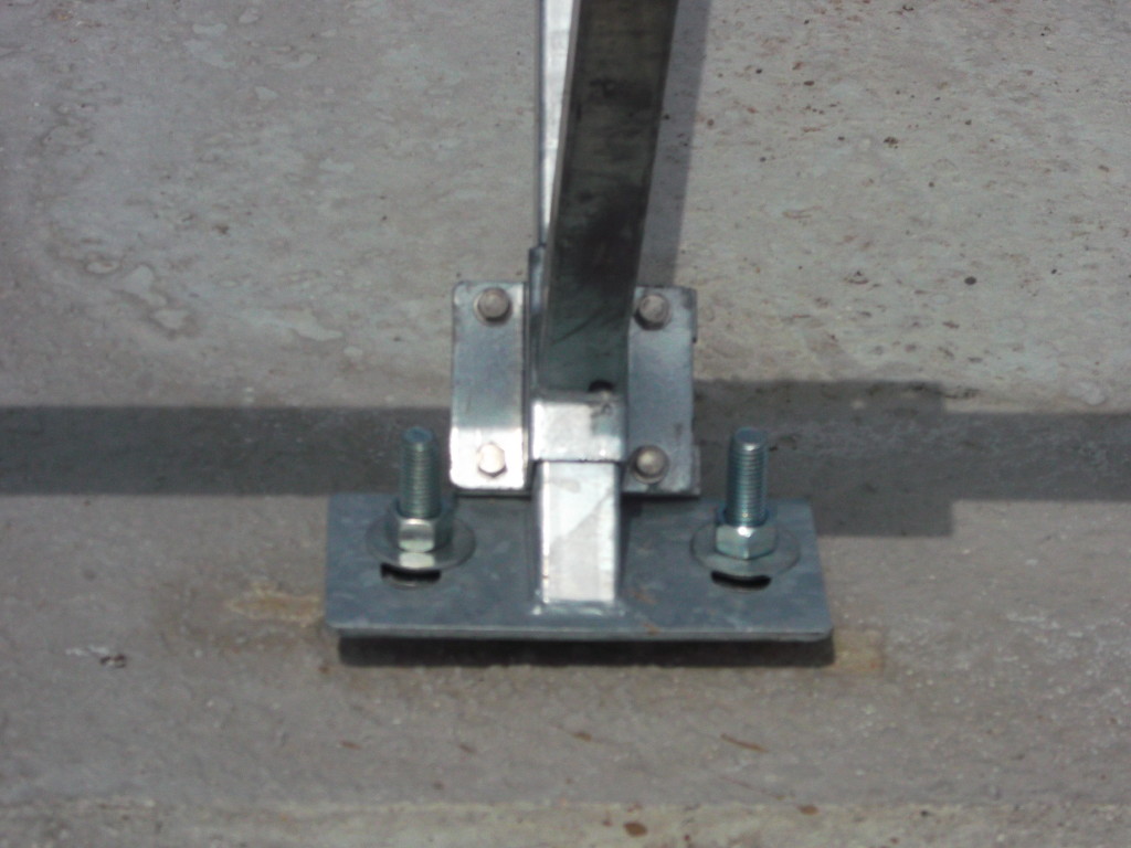 Closeup view of the solar racking attachment to the ballast block